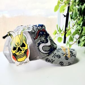 Rare, trucker hat featuring an Ed Hardy Skull w/ dragon rhinestone graphic.